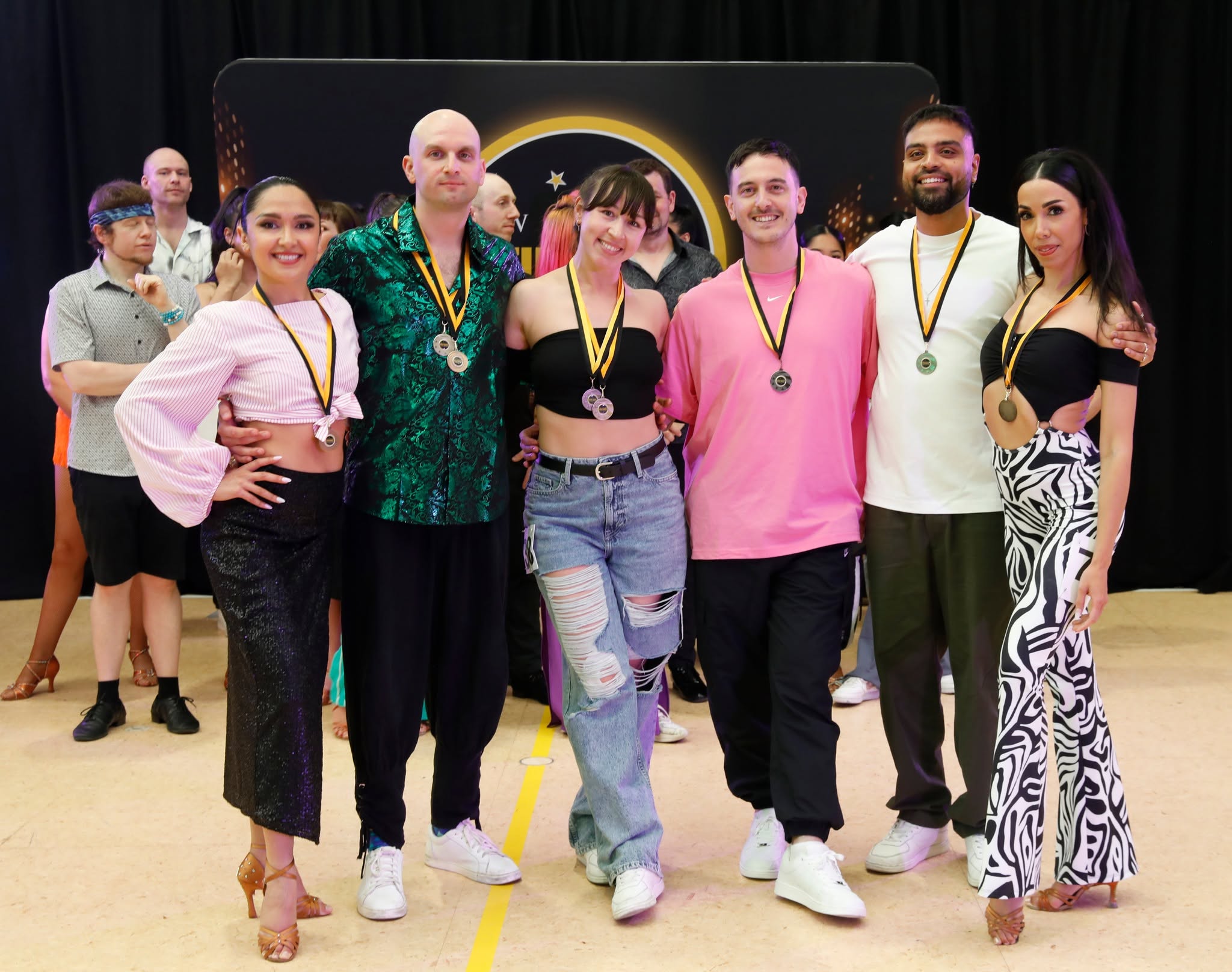 Medalists posing together after the presentation
