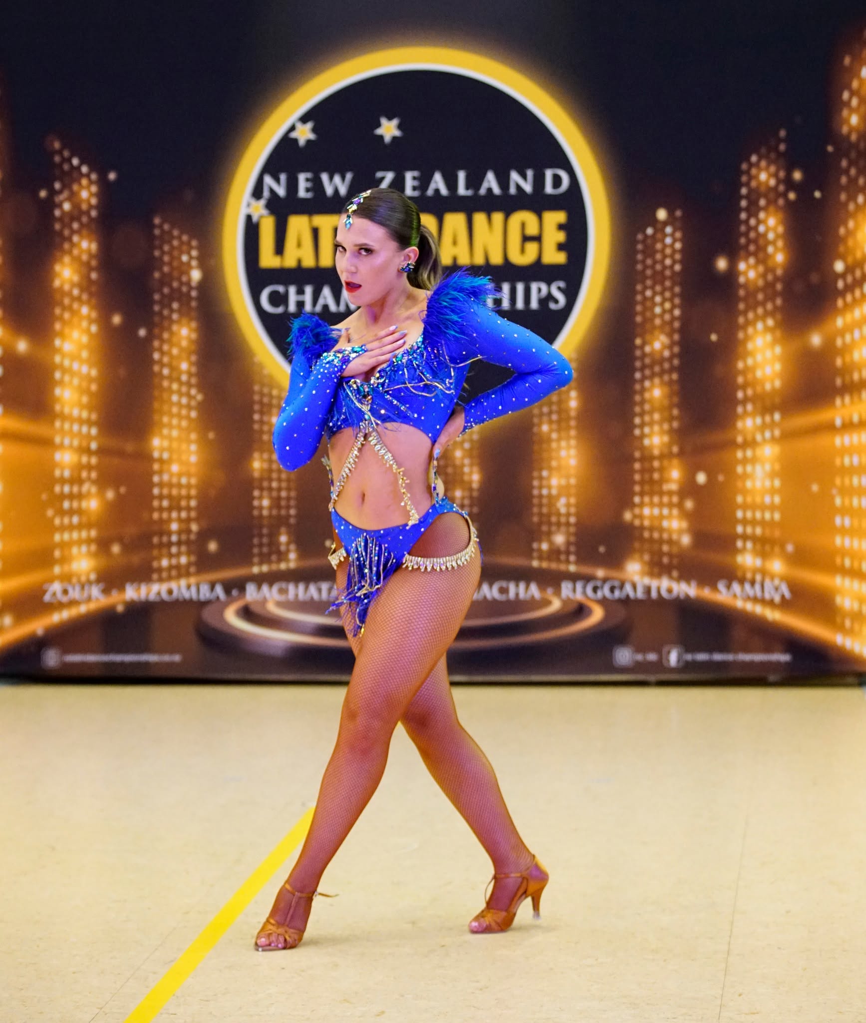 Soloist in a blue rhinestone costume
